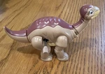 Vtg 1997 Land Before Time Little Foot Dinosaur Burger King Wind Up Toy Figure. Fixed Price $8.99.