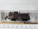Micro Trains Line Scale 34' Wood Caboose Atchison, Topeka & Santa Fe #1209. Fixed Price $20.00.