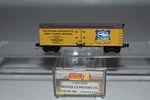 Z Scale Mtl 51800190 Nuckoll's Packing 40' Single Door Boxcar 100 C33457. Fixed Price $24.99.