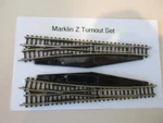 Marklin Z- Manual Right/left Turnout #8564/8561 Ln. Fixed Price $37.95.