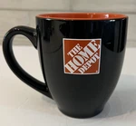 The Home Depot Black 14 Oz Coffee Cup Mug. Fixed Price $11.99.