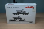 Marklin 48692 Ho Scale Heavy Duty Flat Cars With Dump Trucks. Fixed Price $94.99.