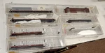 7 New Micro Trains Line 2 89' Flat 50' Cars ,n Scale Atsf &trailer. Fixed Price $110.00.