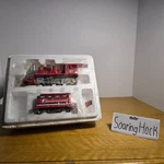 "budweiser Holiday Express" Illuminated Full Train Set W/ Tracks. Fixed Price $250.00.