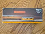 Rklin Mini-club 8802 Z Gauge Locomotive Yellow Schienenreinigungswagen. Fixed Price $100.00.